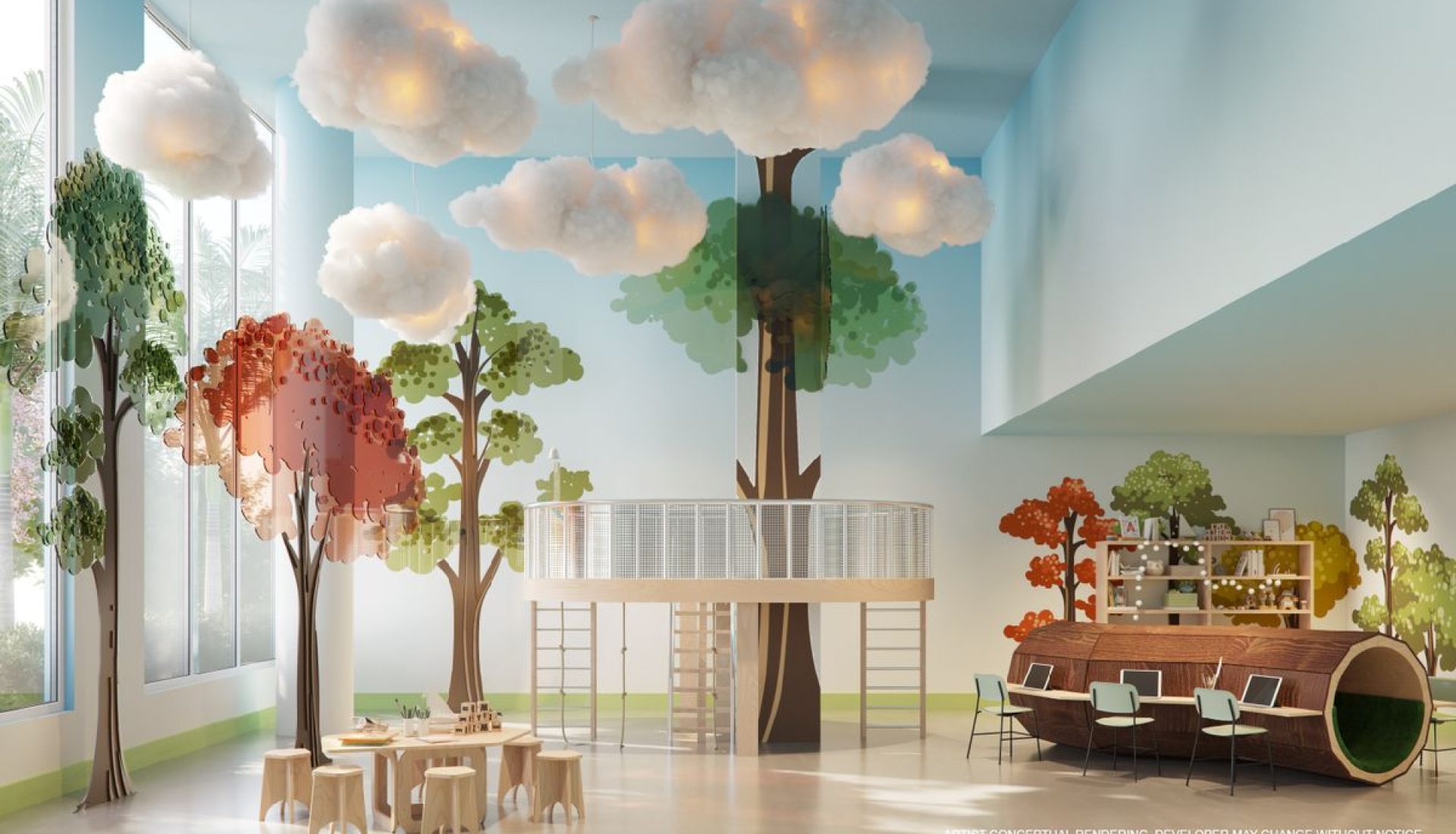 Forest-themed indoor playroom with a tree-mural wall, hanging cloud lights, and a wooden climbing platform edge surrounded by small stools and tables.