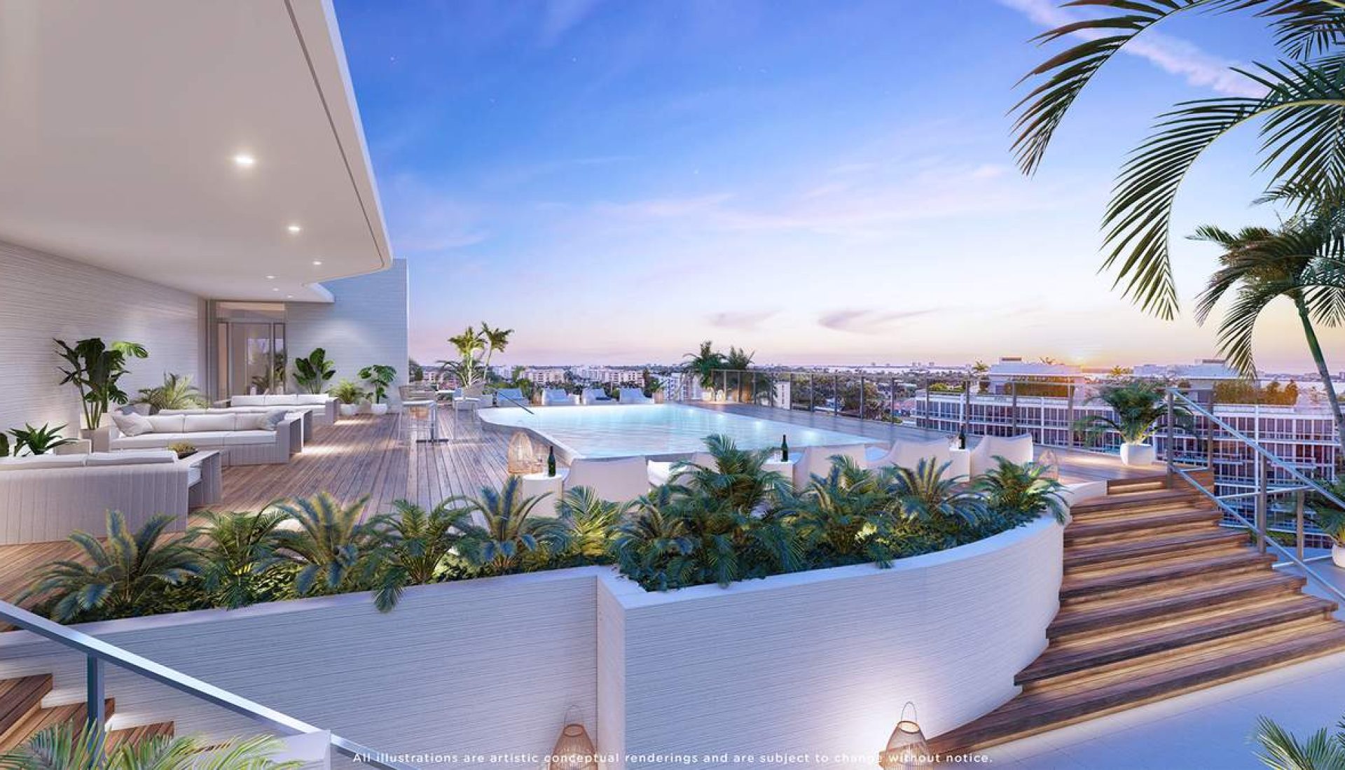 Luxurious rooftop pool deck with white seating, palm plants, and a city skyline at sunset.