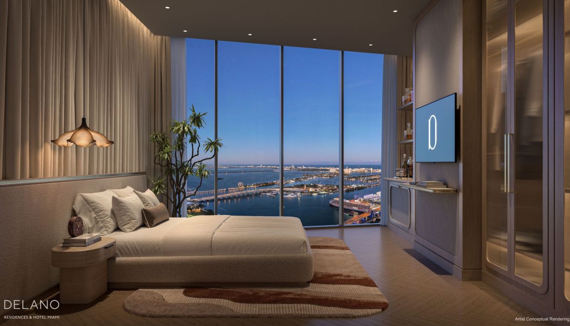 Luxurious hotel bedroom with a king-size bed, soft lighting, and a panoramic floor-to-ceiling window overlooking a marina and blue water.