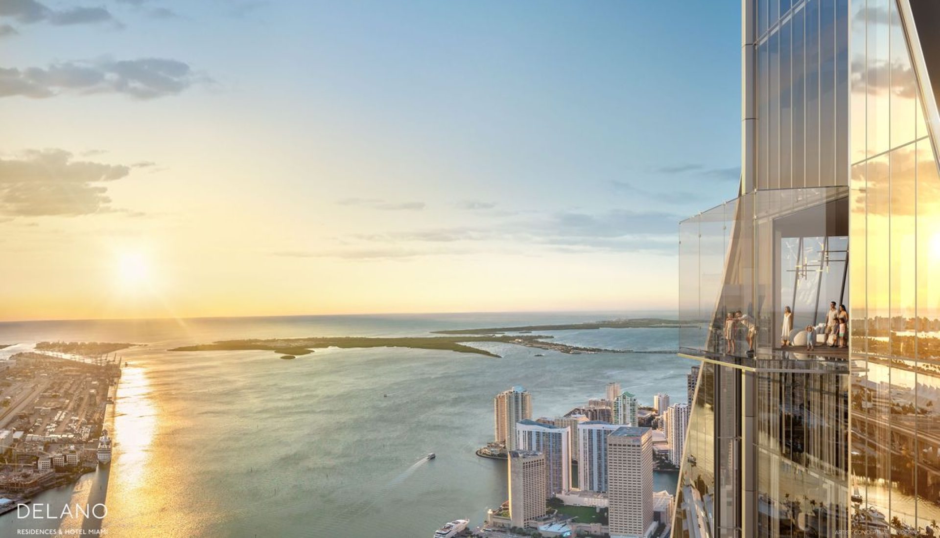 Sunset over Miami harbor viewed from a glass-walled high-rise balcony with people standing on the terrace.