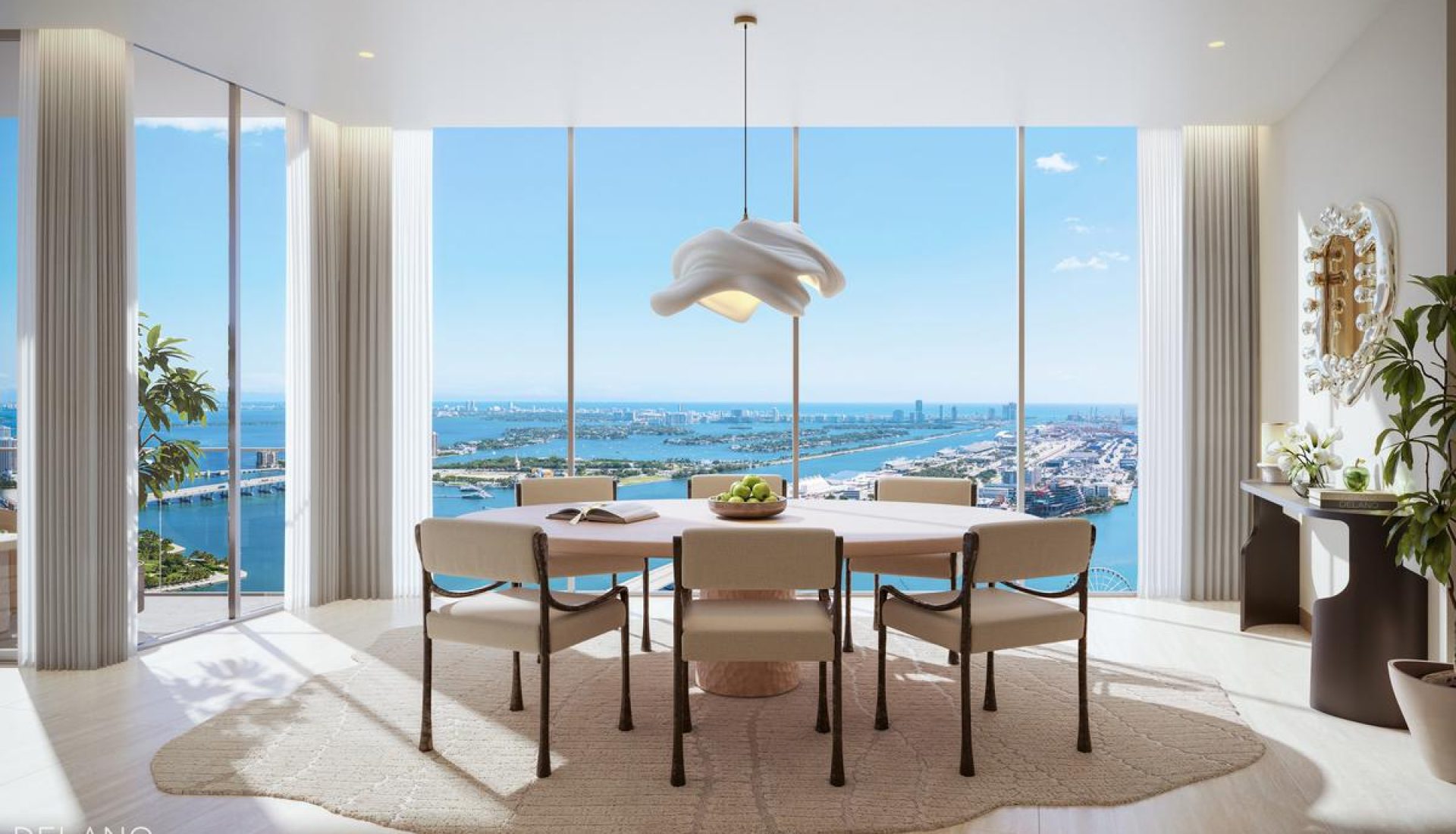 Round dining table with eight cushioned chairs in a bright, modern room, overlooking a marina and blue sea through floor-to-ceiling windows.