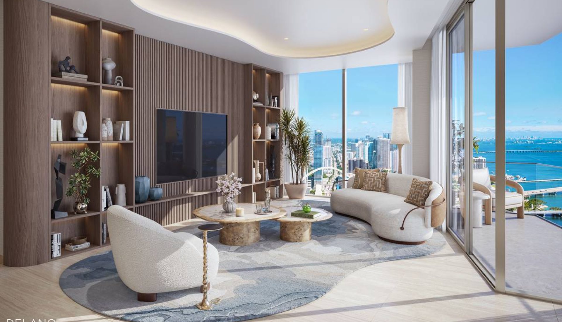 Luxurious modern living room with curved white sofa, wooden built-ins, and a city skyline and water view through floor-to-ceiling windows.