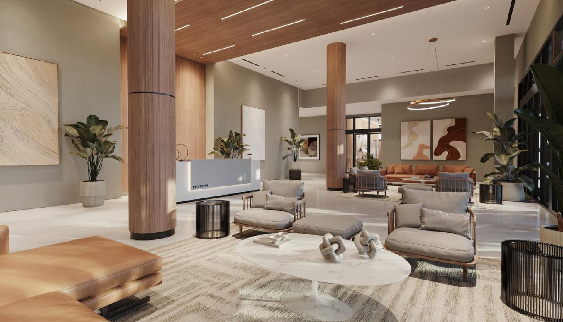 Luxurious hotel lobby with beige sofas, round marble coffee table, and tall wooden columns
