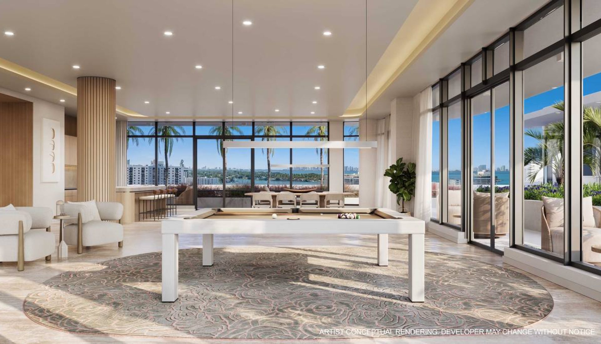 Luxurious open-plan lounge with a white billiards table, circular rug, and floor-to-ceiling windows showing palm trees and a city view.