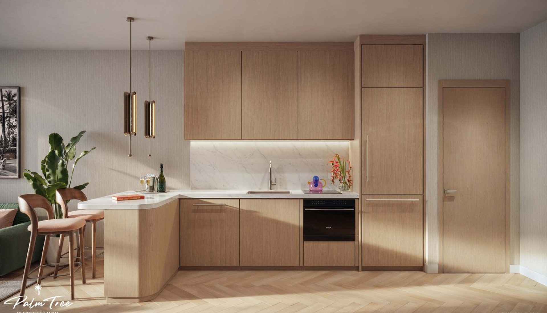 Modern kitchen with light wood cabinets, curved island, and marble backsplash under warm pendant lighting.