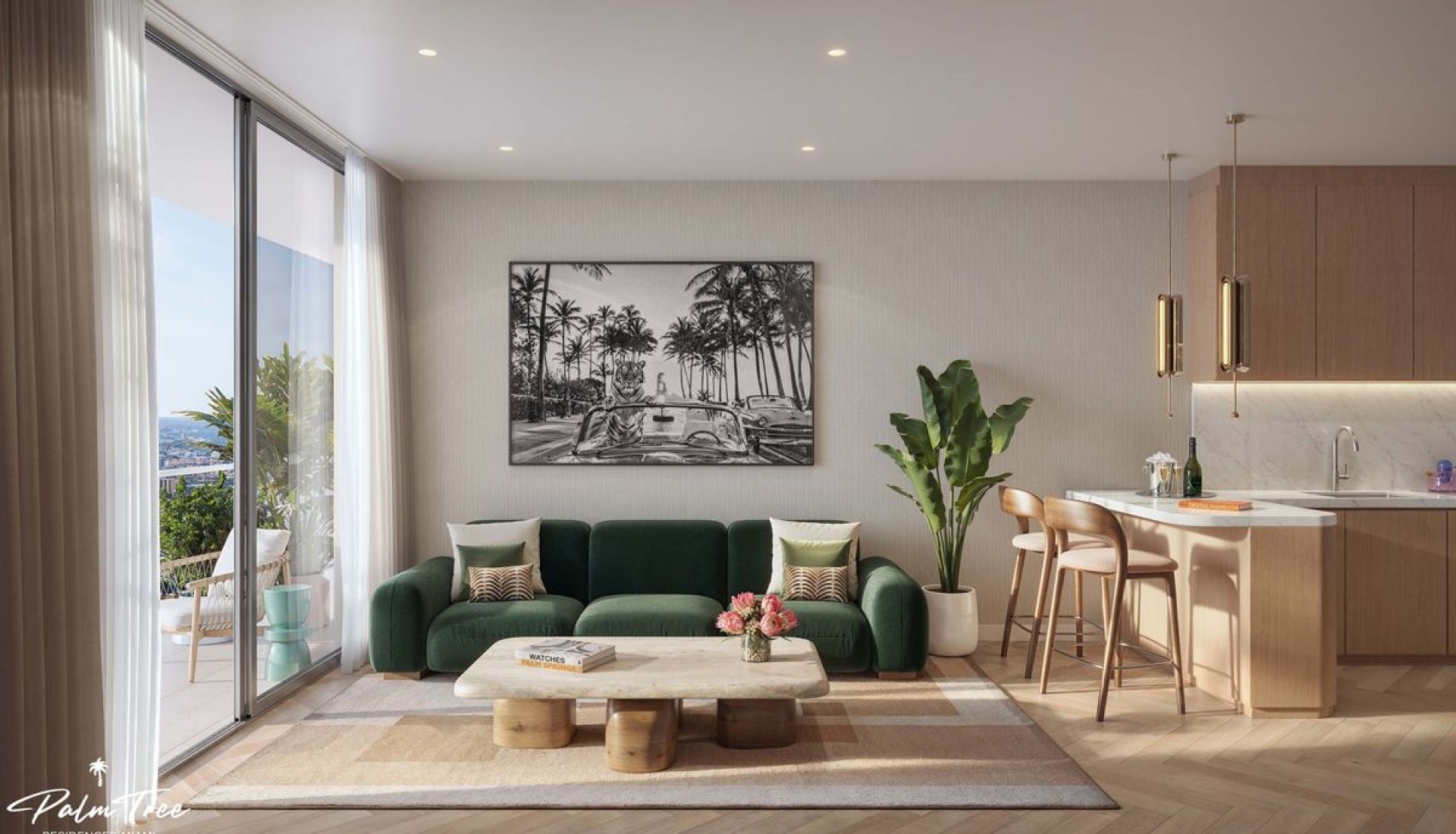 Open-plan living area with a dark-green sofa, wooden coffee table, and a large palm-print artwork, connected to a kitchen island and balcony view to the left.