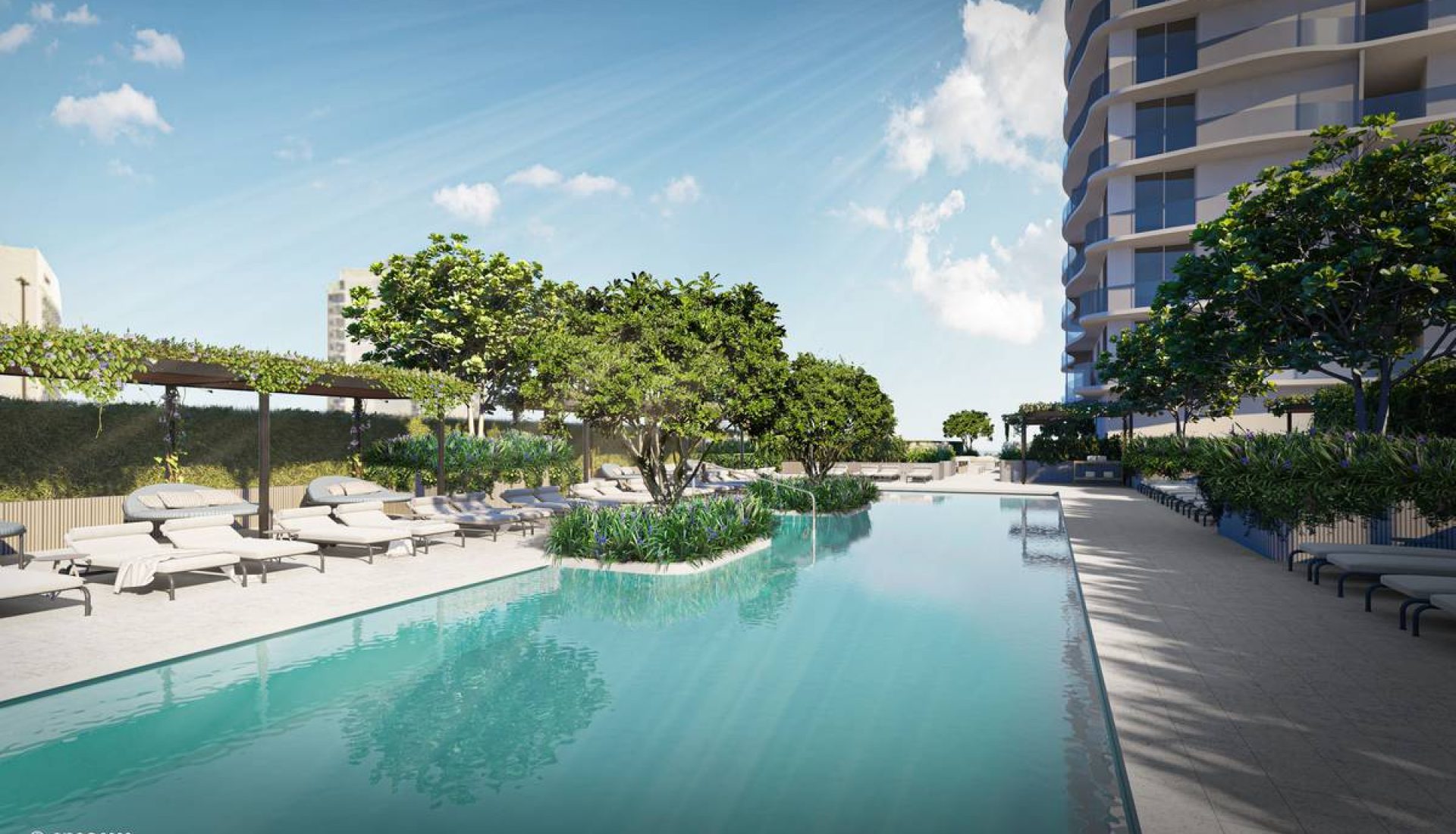 Hotel pool area with lounge chairs under shaded pergolas, trees and a modern high-rise on the right, under a blue sky.